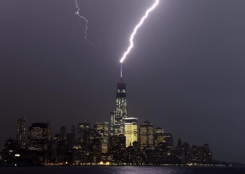 A bolt of lightning hits the antenna on top of One World Trade Center in Lower Manhattan, New York, USA, as an electrical storm moves over New York. Gary Hershorn / EPA