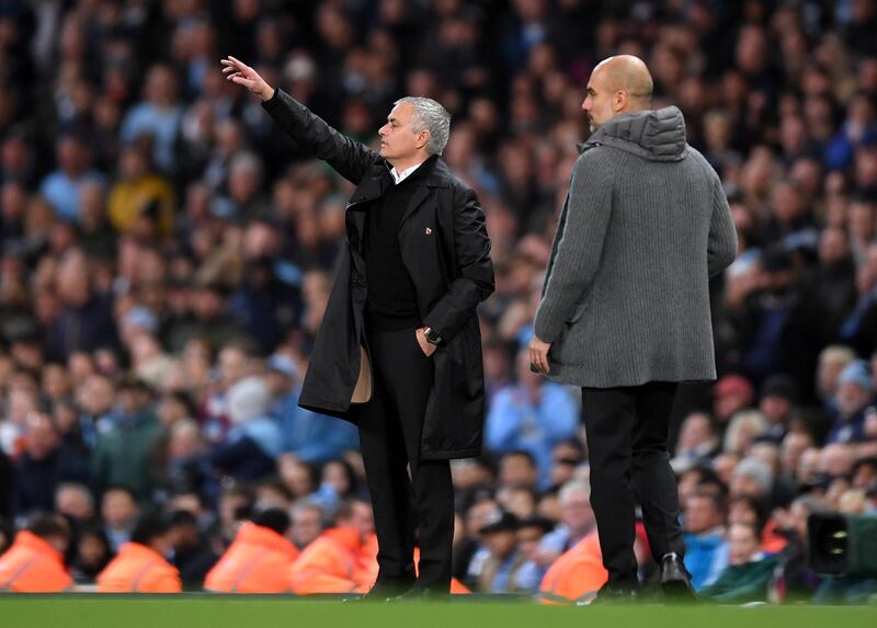 MANCHESTER, ENGLAND - NOVEMBER 11:  Jose Mourinho, Manager of Manchester United signals as Josep Guardiola, Manager of Manchester City looks on during the Premier League match between Manchester City and Manchester United at Etihad Stadium on November 11, 2018 in Manchester, United Kingdom.  (Photo by Laurence Griffiths/Getty Images)