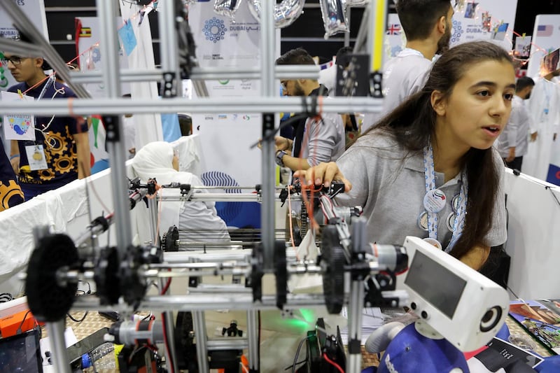 DUBAI , UNITED ARAB EMIRATES , October 26 – 2019 :- Amneh Kabobur from Hope (Refugees) team explaining about their robot at the First Global Challenge robotics competition held at Festival Arena in Dubai.  ( Pawan Singh / The National ) For News. Story by Patrick
