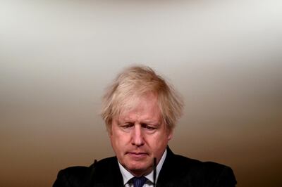 FILE PHOTO: British Prime Minister Boris Johnson attends a coronavirus news conference at 10 Downing Street, London, Britain January 22, 2021. The prime minister announced that the new variant of SARS-CoV-2, which was first discovered in the south of England, appears to be linked with an increase in the mortality rate. Leon Neal/Pool via REUTERS/File Photo