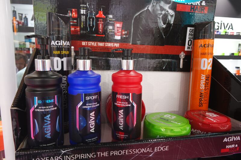 Hair products for males are packaged to resemble protein tubs and athletic water bottles. Photo by Hafsa Lodi