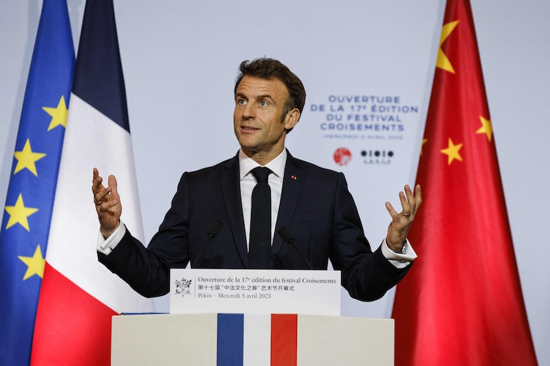 Mr Macron delivers a speech at the Red Brick Museum. AFP