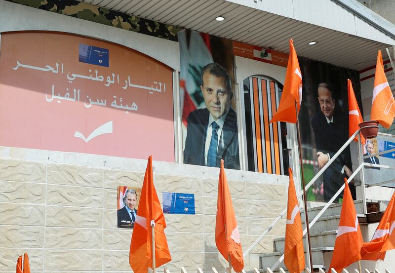 Pictures of Lebanese President Michel Aoun and leader of Lebanon's Free Patriotic Movement, Gebran Bassil, at the party's office in Sin El Fil in May. Reuters