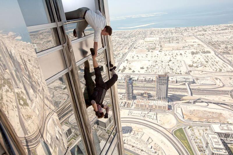 Tom Cruise is dangled outside of the Burj Khalifa by Jeremy Renner in Mission: Impossible – Ghost Protocol, which was partly filmed in Dubai. Paramount / Everett / REX



