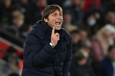 Tottenham Hotspur's Italian head coach Antonio Conte reacts during the English Premier League football match between Southampton and Tottenham Hotspur at St Mary's Stadium in Southampton, southern England on December 28, 2021.  (Photo by Glyn KIRK / AFP) / RESTRICTED TO EDITORIAL USE.  No use with unauthorized audio, video, data, fixture lists, club/league logos or 'live' services.  Online in-match use limited to 120 images.  An additional 40 images may be used in extra time.  No video emulation.  Social media in-match use limited to 120 images.  An additional 40 images may be used in extra time.  No use in betting publications, games or single club/league/player publications.   /  