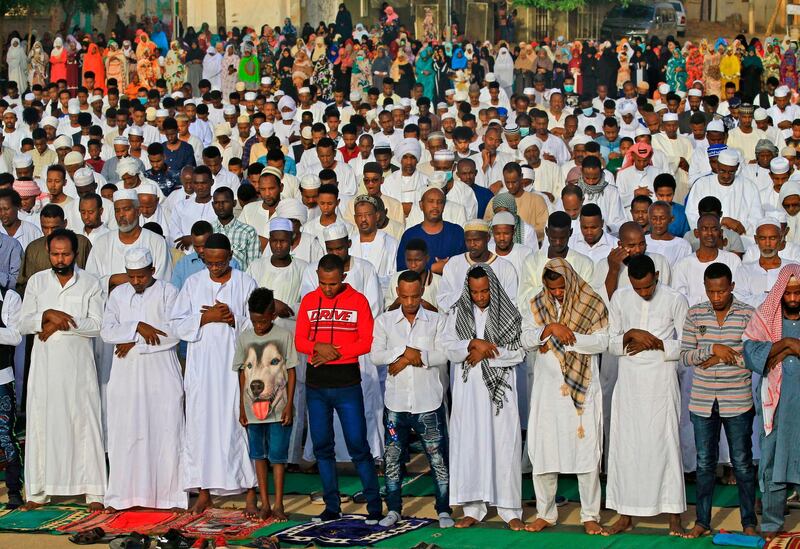 Muslim worshippers gather for Eid Al Fitr prayers in the district of Jureif Gharb of Sudan's capital Khartoum AFP