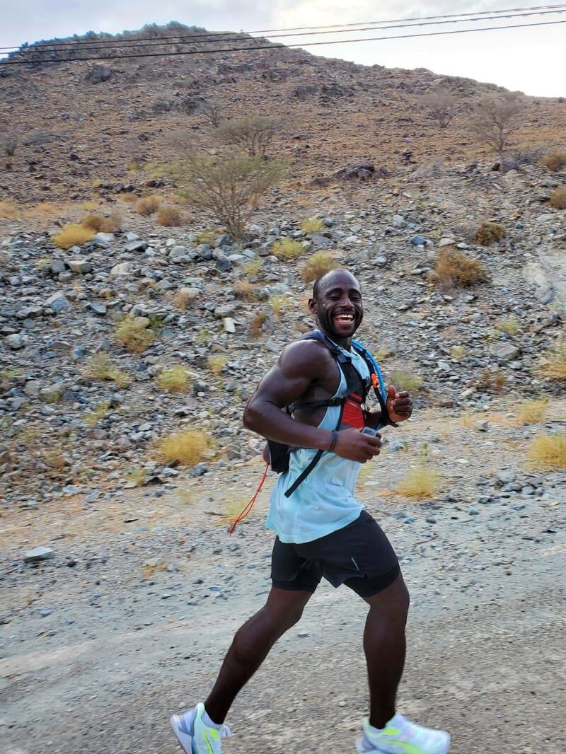 Souleymane Ghani takes on the hills near Hatta on Sunday afternoon, a few hours into his run.