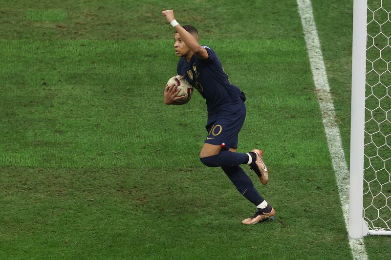 Kylian Mbappe celebrates after scoring the first France goal. Getty