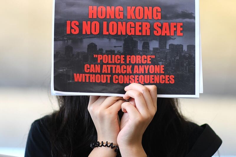 Pro-democracy protesters gather against the police brutality and the controversial extradition bill at Hong Kong's international airport.  AFP