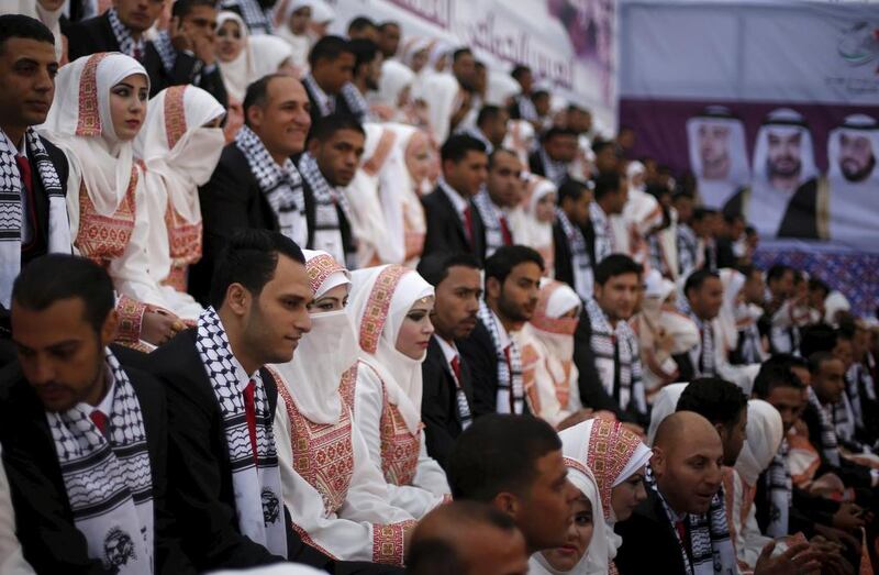 The mass wedding for 200 couples in Gaza City was funded by the Khalifa bin Zayed Al Nahyan Foundation. Mohammed Salem / Reuters