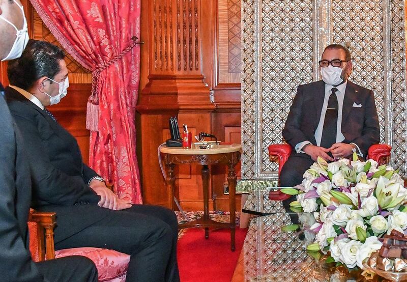 King Mohammed VI meets officials at the palace in Casablanca.  Wearing face masks in public is now obligatory in Morocco. AFP