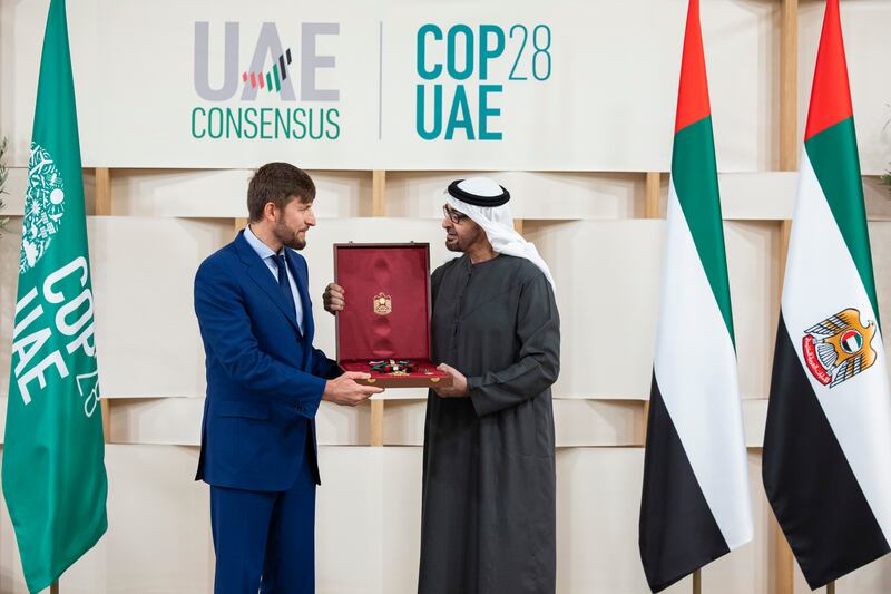 Ruslan Edelgeriev, Special Presidential Envoy for Climate of Russia is awarded the First Class Order of Zayed II medal by President Sheikh Mohamed. Ryan Carter / Presidential Court