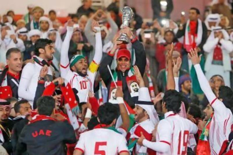 UAE fans were ecstatic after Mahdi Ali, centre, and his team raised the Gulf Cup in triumph, but the national team coach is now stalking bigger prizes starting with qualifying for the 2015 Asian Cup.