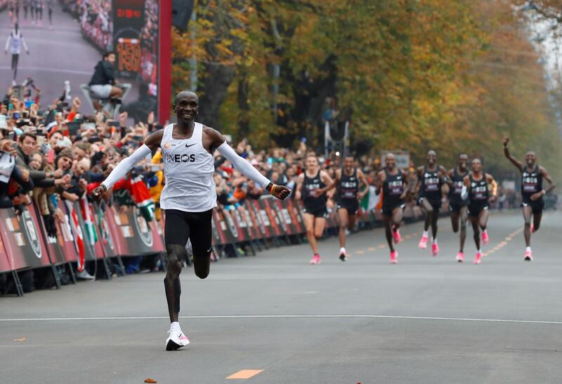 Kenya's Eliud Kipchoge, the marathon world record holder, crosses the finish line during his attempt to run a marathon in under two hours in Vienna, Austria. REUTERS