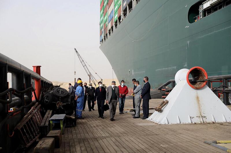 Egyptian officials oversee the operation to free Taiwan-owned cargo MV Ever Given after it become stuck in the Suez Canal. AFP