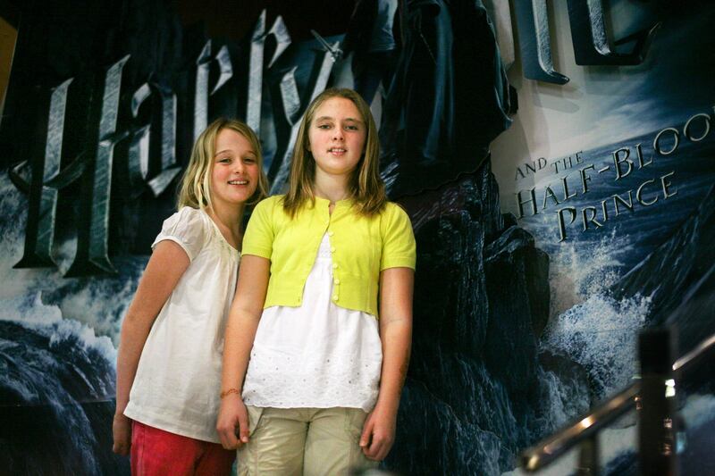 Abu Dhabi, United Arab Emirates - July 16  Polly-Jane Cunningham, 9, (left) and Harriet Bryant, 11 , both avid Harry Potter fans, were among the first in Abu Dhabi to view the latest film installment, "Harry Potter and the Half-Blood Prince" on Thursday, July 16, 2009.  ( Delores Johnson / The National ) *** Local Caption ***  dj_16jul09_a&l_HarryPotter_005.jpg