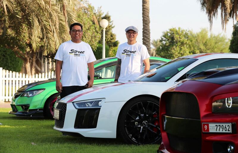 ABU DHABI , UNITED ARAB EMIRATES ,  October 14 , 2018 :- Left to Right ��� Zingiber Umali and Glenn Navarro , organizers with the Modified cars for the StreeMeet car show which will be taking place on 26th October at the Abu Dhabi City Golf Club in Abu Dhabi. ( Pawan Singh / The National )  For Weekend. Story by Adam Workman