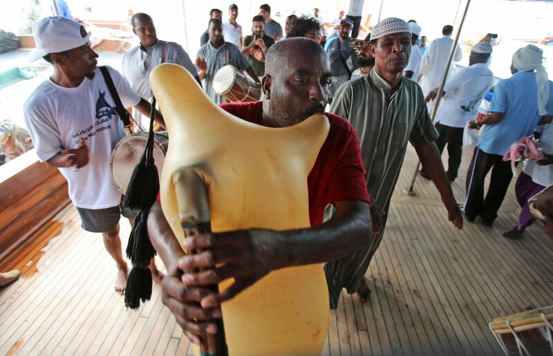 Sailors dance with traditional music a day ahead of the race. (Kamran Jebreili / AP Photo