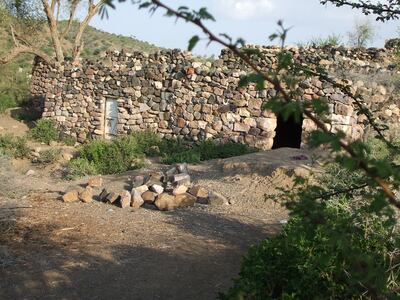 The stone house in Al Karaba that Taher Qassim was born in is situated in a remote area where the inhabitants live with no electricity or running water much as their ancestors before them. Courtesy Taher Qassim