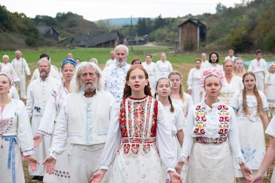 Set in rural Sweden, Midsommar explores the theme of strangers entering a close-knit community. Photo: A24