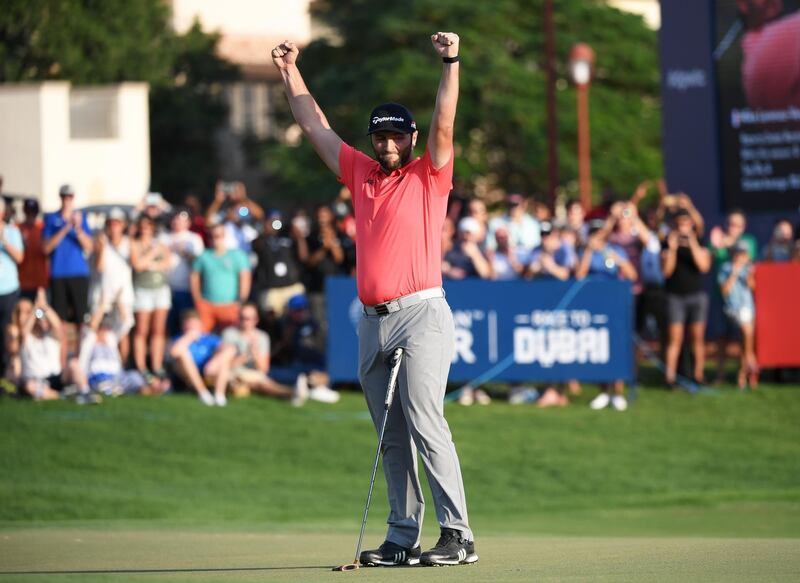 Jon Rahm celebrates after his birdie on the eighteenth. Getty