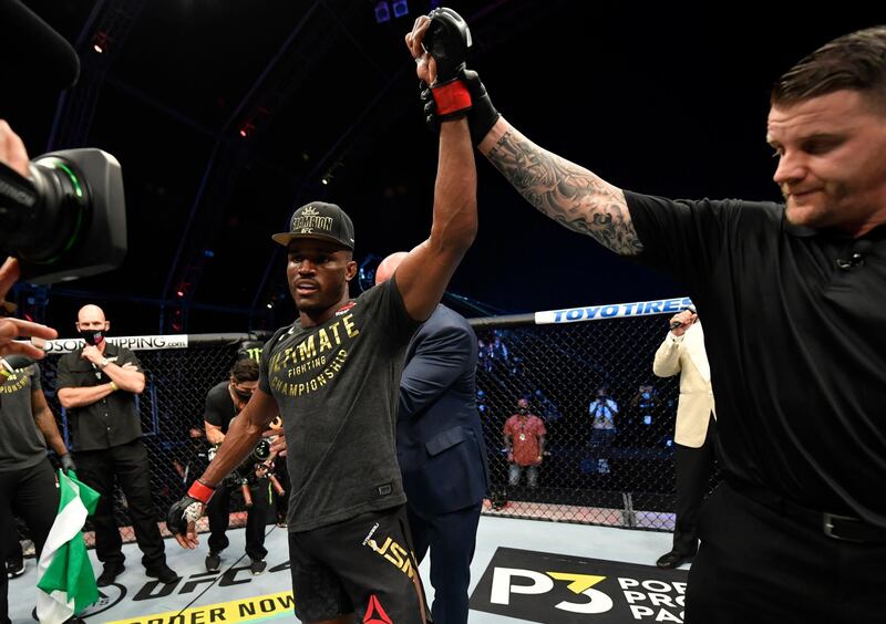 ABU DHABI, UNITED ARAB EMIRATES - JULY 12: Kamaru Usman of Nigeria celebrates after his victory over Jorge Masvidal in their UFC welterweight championship fight during the UFC 251 event at Flash Forum on UFC Fight Island on July 12, 2020 on Yas Island, Abu Dhabi, United Arab Emirates. (Photo by Jeff Bottari/Zuffa LLC) *** Local Caption *** ABU DHABI, UNITED ARAB EMIRATES - JULY 12: Kamaru Usman of Nigeria celebrates after his victory over Jorge Masvidal in their UFC welterweight championship fight during the UFC 251 event at Flash Forum on UFC Fight Island on July 12, 2020 on Yas Island, Abu Dhabi, United Arab Emirates. (Photo by Jeff Bottari/Zuffa LLC)