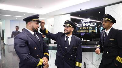 The brothers say working at Etihad Airways is like working with extended family. Suhail Rather / The National