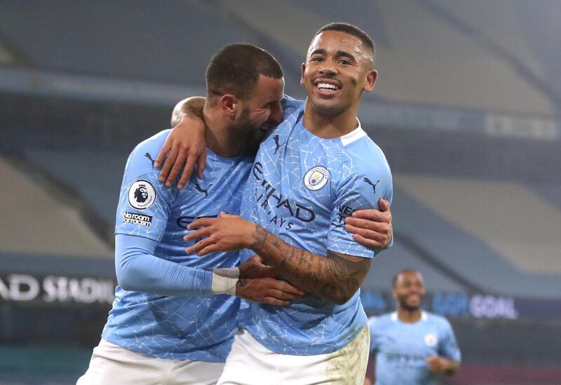 Gabriel Jesus, right. celebrates scoring Manchester City's second goal in their 4-1 win over Wolves on March 2. Reuters