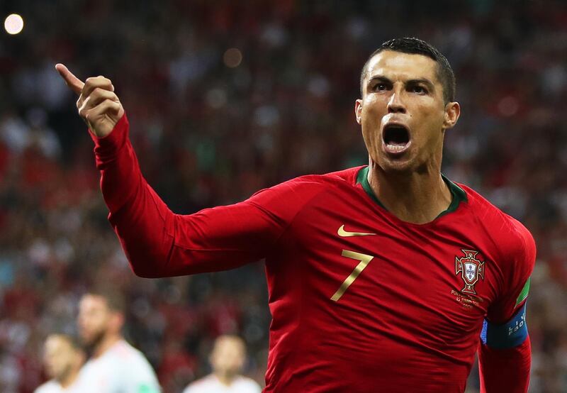 epaselect epa06811175 Cristiano Ronaldo of Portugal celebrates after scoring the 1-0 lead from the penalty spot during the FIFA World Cup 2018 group B preliminary round soccer match between Portugal and Spain in Sochi, Russia, 15 June 2018.

(RESTRICTIONS APPLY: Editorial Use Only, not used in association with any commercial entity - Images must not be used in any form of alert service or push service of any kind including via mobile alert services, downloads to mobile devices or MMS messaging - Images must appear as still images and must not emulate match action video footage - No alteration is made to, and no text or image is superimposed over, any published image which: (a) intentionally obscures or removes a sponsor identification image; or (b) adds or overlays the commercial identification of any third party which is not officially associated with the FIFA World Cup)  EPA/FRIEDEMANN VOGEL   EDITORIAL USE ONLY  EDITORIAL USE ONLY
