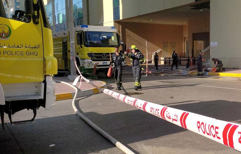 Al Wahda Mall closed on Wednesday as fire crews and police investigated a blaze and smoke and fumes cleared. Fatima Al Marzooqi / The National