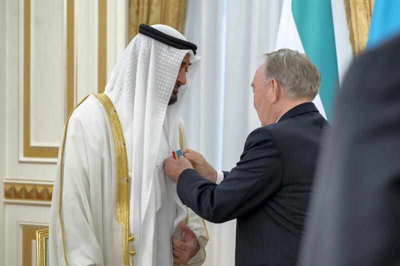 ASTANA, KAZAKHSTAN - July 04, 2018: HH Sheikh Mohamed bin Zayed Al Nahyan, Crown Prince of Abu Dhabi and Deputy Supreme Commander of the UAE Armed Forces (L) attends a reception hosted by HE Nursultan Nazarbayev, President of Kazakhstan (), at Ak Orda Presidential Palace.