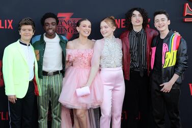 epa07681510 Cast members pose for photos on the red carpet prior to the premiere of 'Stranger Things: Season 3' in Santa Monica, California, USA, 28 June 2019. The television show will be released on 04 July 2019. EPA/ETIENNE LAURENT