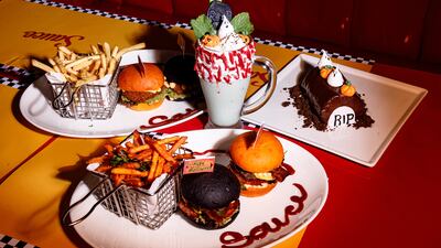 Eerie orange and black burgers will be available at Sauce to celebrate Halloween. Photo: Sauce
