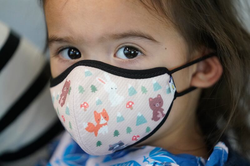 A 2-year-old prepares to receive a Moderna Covid-19 vaccination in Salt Lake City, Utah. AP