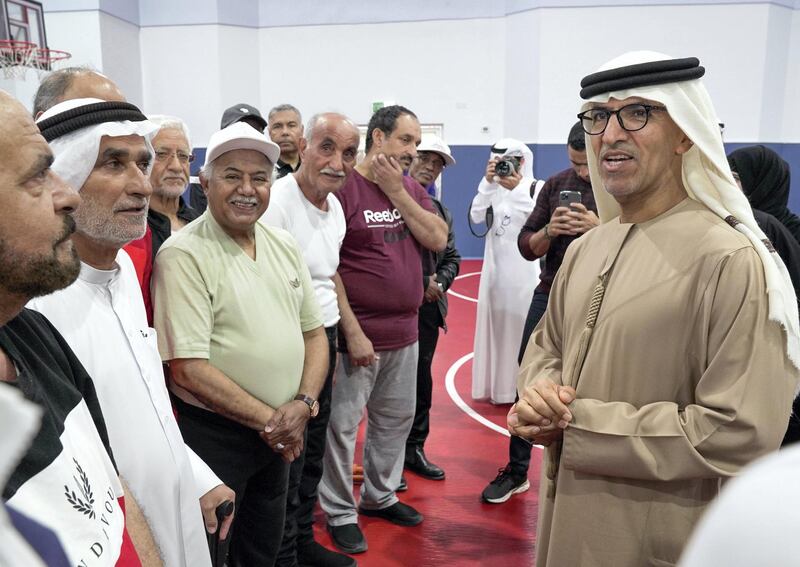 Abu Dhabi, United Arab Emirates, February 12, 2020.  
The launch of an “Active Seniors Program” by the Department of Community Development, at the Family Development Foundation, aspart of “Get Fit Abu Dhabi”.
--
H.E. Dr. Mugheer Khamis Al Khaili, Chairman of the Department of Community Development chats with some senior fitness buffs  at the Family Development Foundation Gym.
Victor Besa / The National
Section:  NA
Reporter:  Haneen Dajani