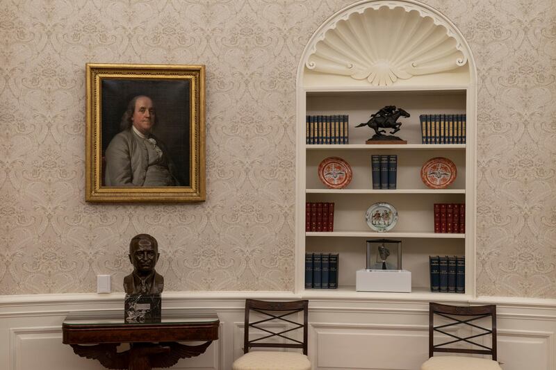 On the the table is a bust of former President Harry Truman at the newly decorated Oval Office of the White House. AP Photo