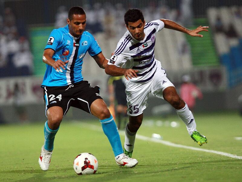 Baniyas defender Thamer Mohammed, left, had a ban reduced from two years to three months after proving he had taken a banned substance inadvertently. Satish Kumar / The National