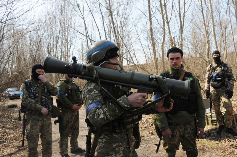 Ukrainian servicemen with a Carl Gustaf M4, a Swedish shoulder-launched weapon, during a training session on the outskirts of Kharkiv on Thursday. AP Photo