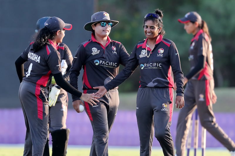 UAE captain Chaya Mughal, centre, celebrates the win over Bhutan. Pawan Singh / The National