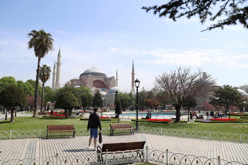 ISTANBUL, TURKEY - APRIL 30: Tourists, exempt from the curfew walk at Sultanahmet square and its surroundings remaining empty after a 17-day full lockdown from Thursday evening until May 17 to stem the spread of coronavirus (COVID-19) pandemic, in Istanbul, Turkey on April 30, 2021. (Photo by Muhammed Enes Yildirim/Anadolu Agency via Getty Images)