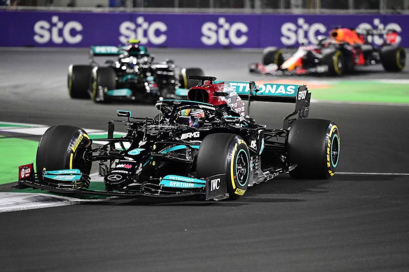 Lewis Hamilton, Mercedes teammate Valtteri Bottas and Red Bull's Max Verstappen. AFP