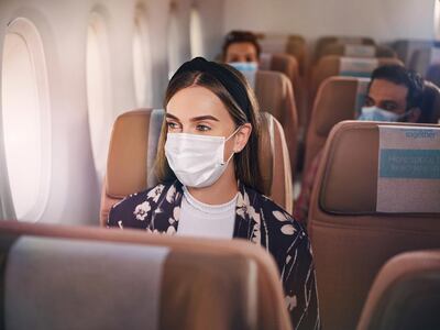 Face masks on flights and in airports are compulsory. Courtesy Etihad 
