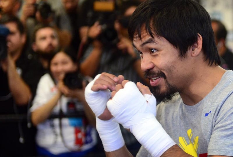 Filipino congressman and world champion boxer Manny Pacquiao took time out from his training ahead of his fight with Floyd Mayweather in Las Vegas, Nevada on May 2, to plead for the life of Filipina Mary Jane Veloso who is on death row in Indonesia. Frederic J Brown/ AFP Photo

