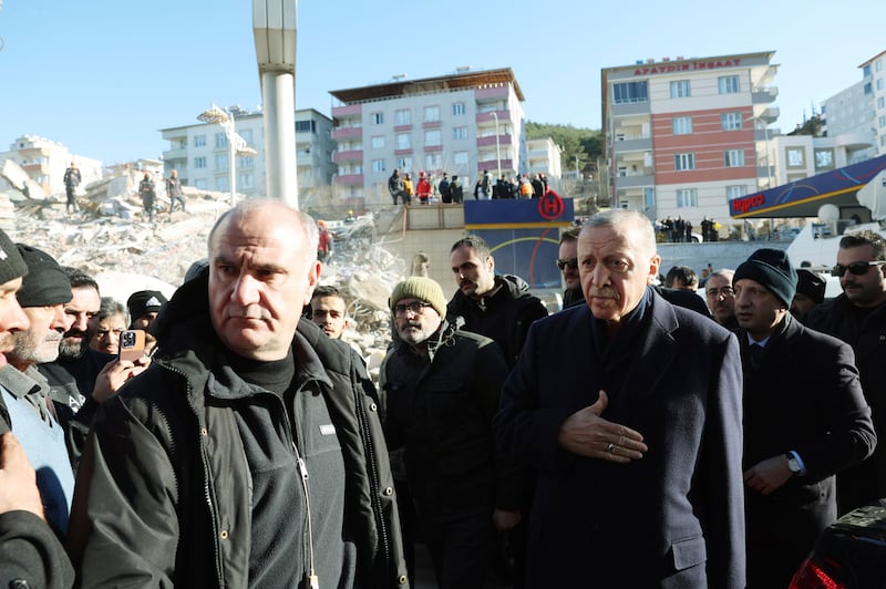 Turkey's President Recep Tayyip Erdogan visits the centre of Kahramanmaras city, days after it was ruined in last year's earthquake. AP