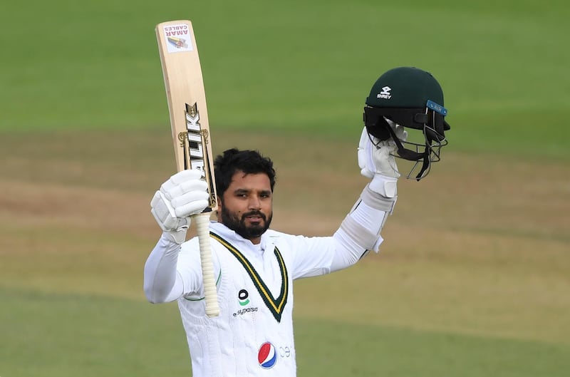 Pakistan's captain Azhar Ali raises his bat after scoring a century during the third day of the third Test against England at the Ageas Bowl in Southampton on Sunday. AP