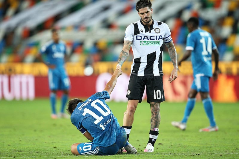 Udinese's Rodrigo De Paul, right, and Juventus' Paulo Dybala on Thursday.  EPA