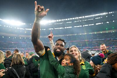 Siya Kolisi of South Africa celebrates victory following the Rugby World Cup Final match between New Zealand and South Africa. Getty