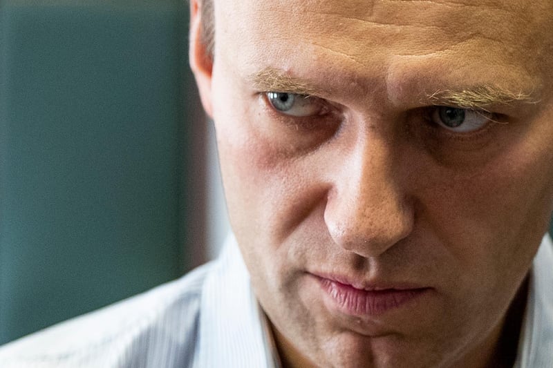 FILE - In this Wednesday, Sept. 5, 2018 file photo Russian opposition leader Alexei Navalny stands during a break in the hearing on his appeal in a court in Moscow, Russia. The German hospital treating Russian opposition leader Alexei Navalny says he has been taking out of an induced coma and is responsive. Berlin's Charite hospital said Monday that Navalny's condition has further improved, allowing doctors to end the medically induced coma and gradually ease him off mechanical ventilation. (AP Photo/Pavel Golovkin, File)