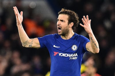 Chelsea's Spanish midfielder Cesc Fabregas gestures to the crowd after Chelsea take the lead during the first leg of the UEFA Champions League round of 16 football match between Chelsea and Barcelona at Stamford Bridge stadium in London on February 20, 2018. / AFP PHOTO / Glyn KIRK