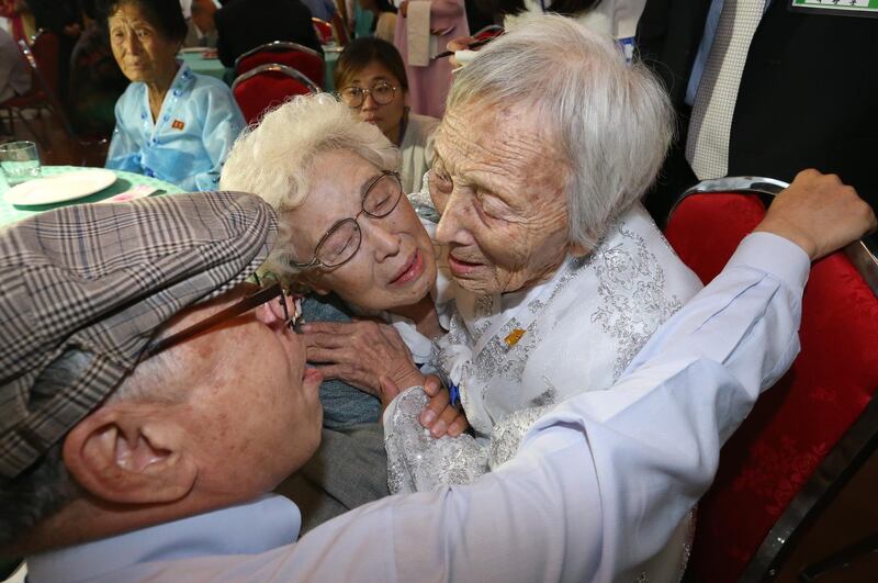 North Korean older sister Cho Sun-do, 89, meets with her South Korean younger sister Cho Hye-do, 86, and younger brother Cho Do-jae, 75. EPA
